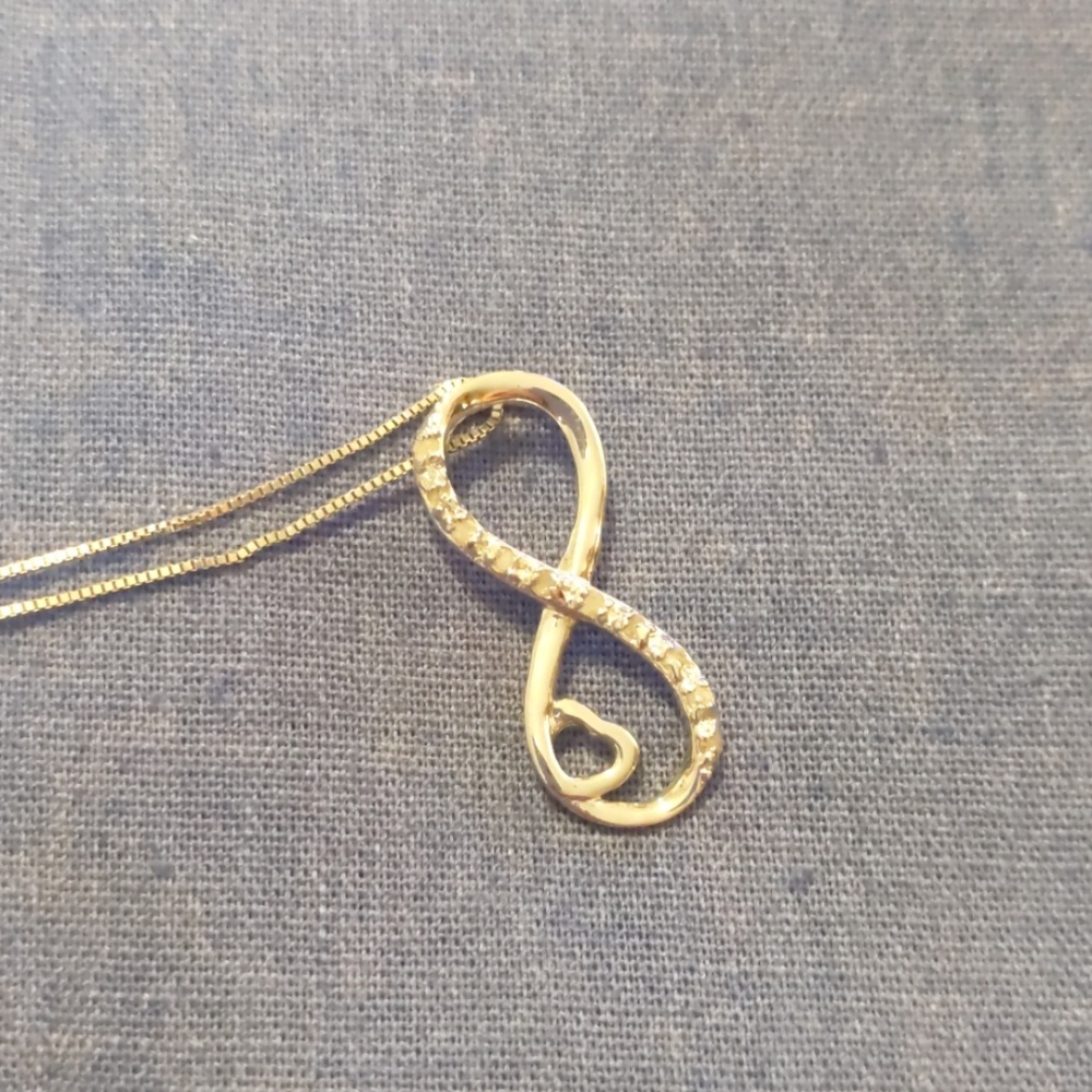 Sterling silver diamond infinity with hear necklac